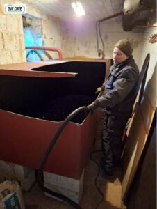 Démontage d'une citerne mazout dans une cave à Manage